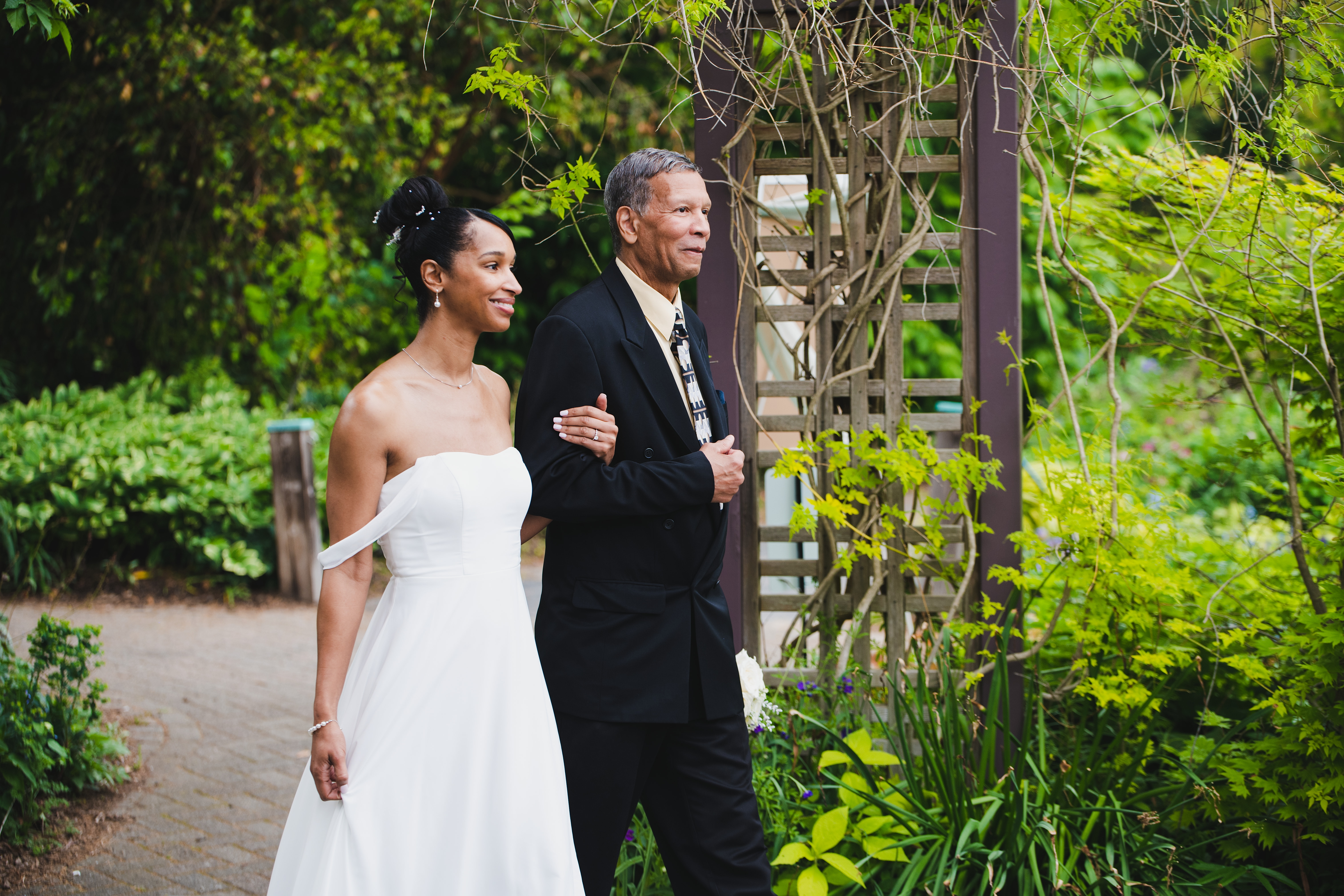 Bride walking with her father